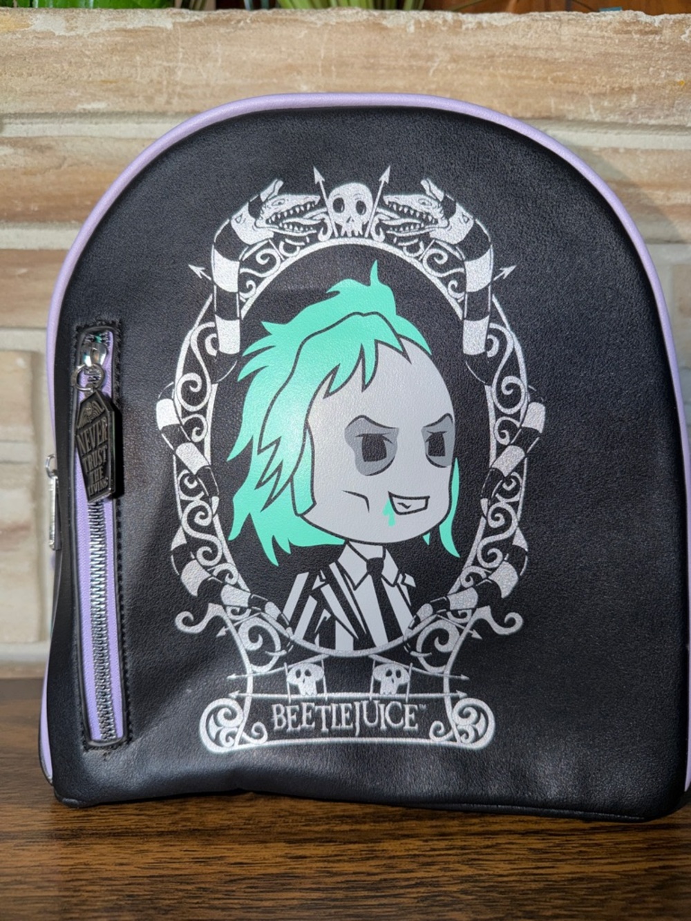 Bioworld Black Beetlejuice Mini Backpack with Mint Green and Purple Trim